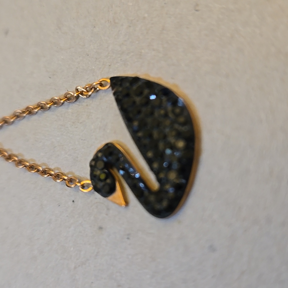 Knockoff black swan necklace NOT Swarovski